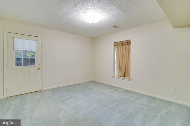 a view of a porch with furniture