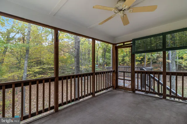 a front view of a house with a garden and porch