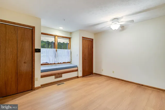 a view of a closet and utility room