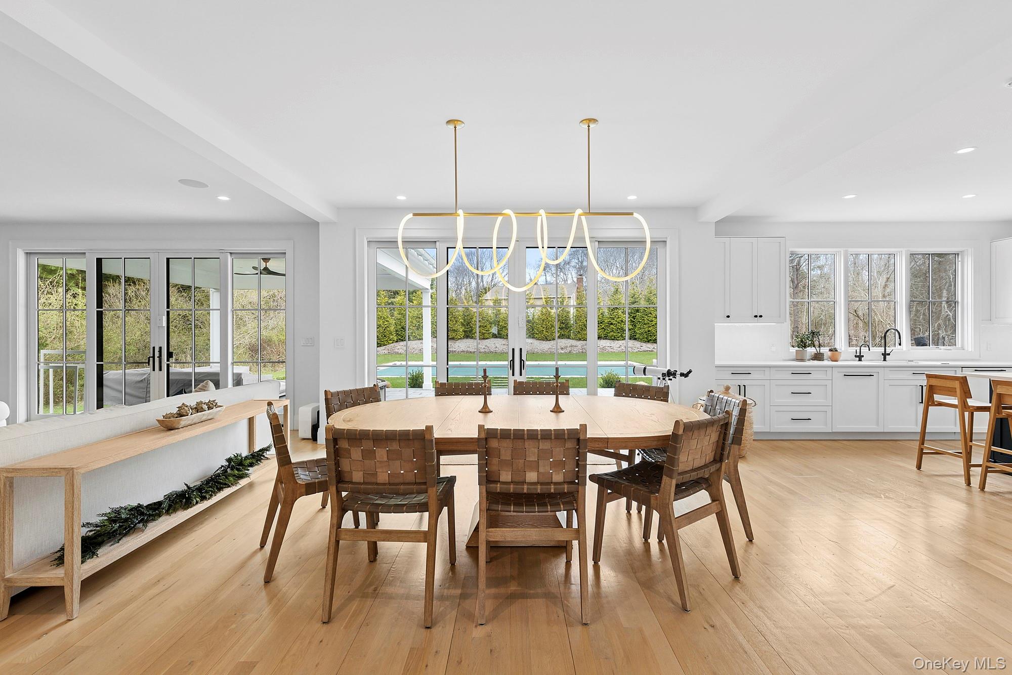 8 Sweetgrass Road Westhampton, NY 11977 - Photo 4 of 20 a view of a dining room with furniture window and wooden floor