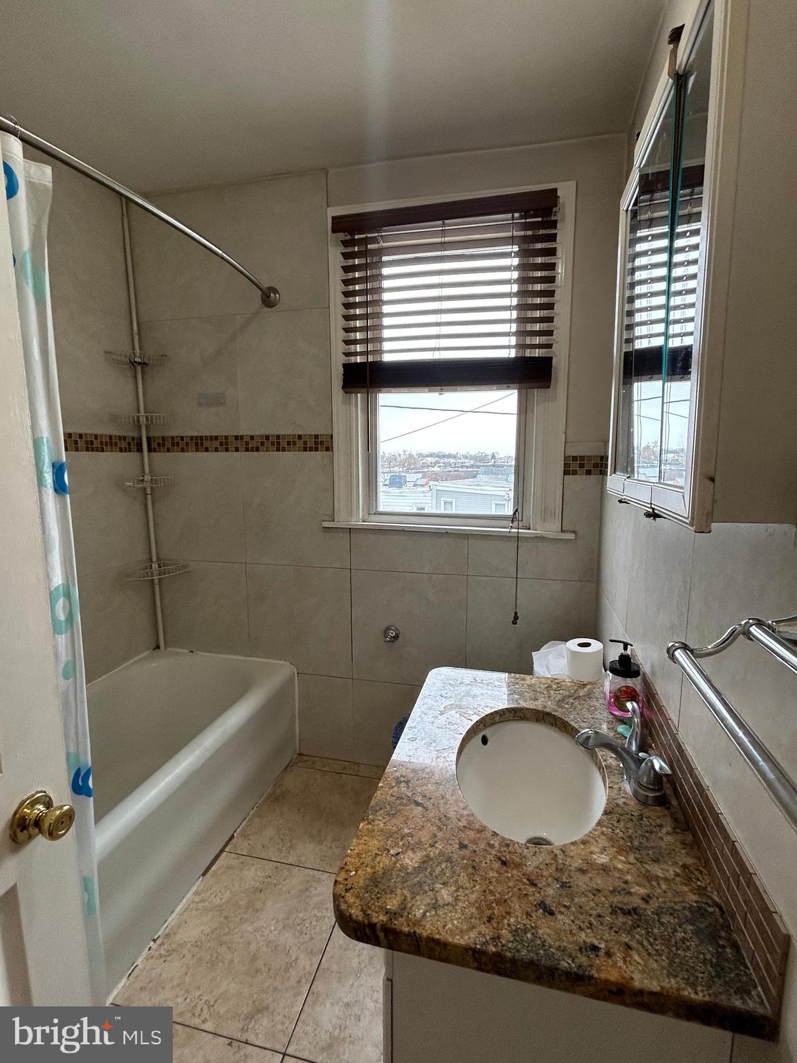 7502 Parkview Road Upper Darby, PA 19082 - Photo 28 of 63 a bathroom with a sink and a bathtub