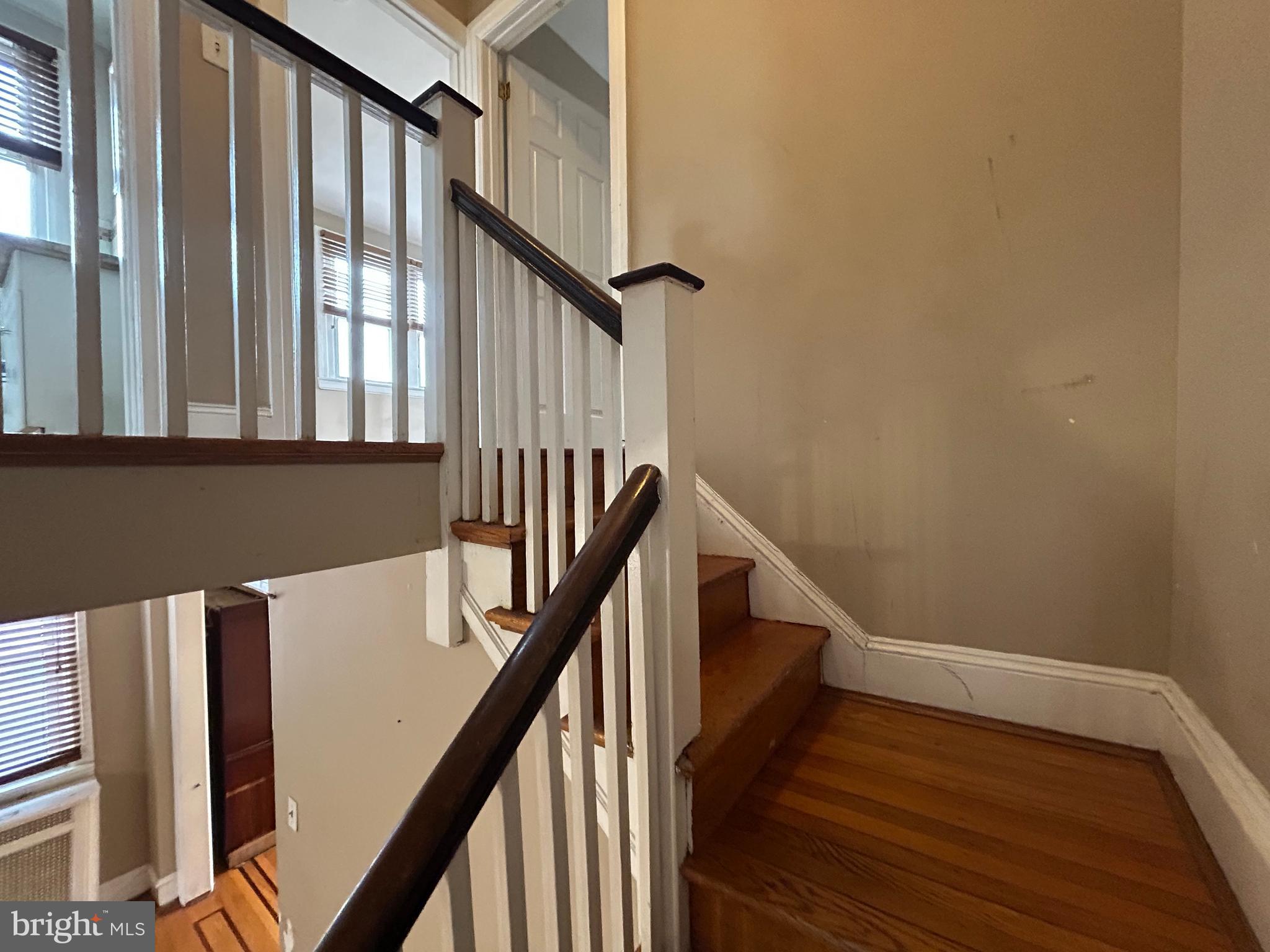 7502 Parkview Road Upper Darby, PA 19082 - Photo 32 of 63 a view of entryway and hall with wooden floor
