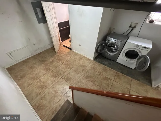 a bathroom with a toilet and a sink