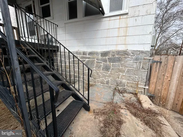 a car parked in front of a house