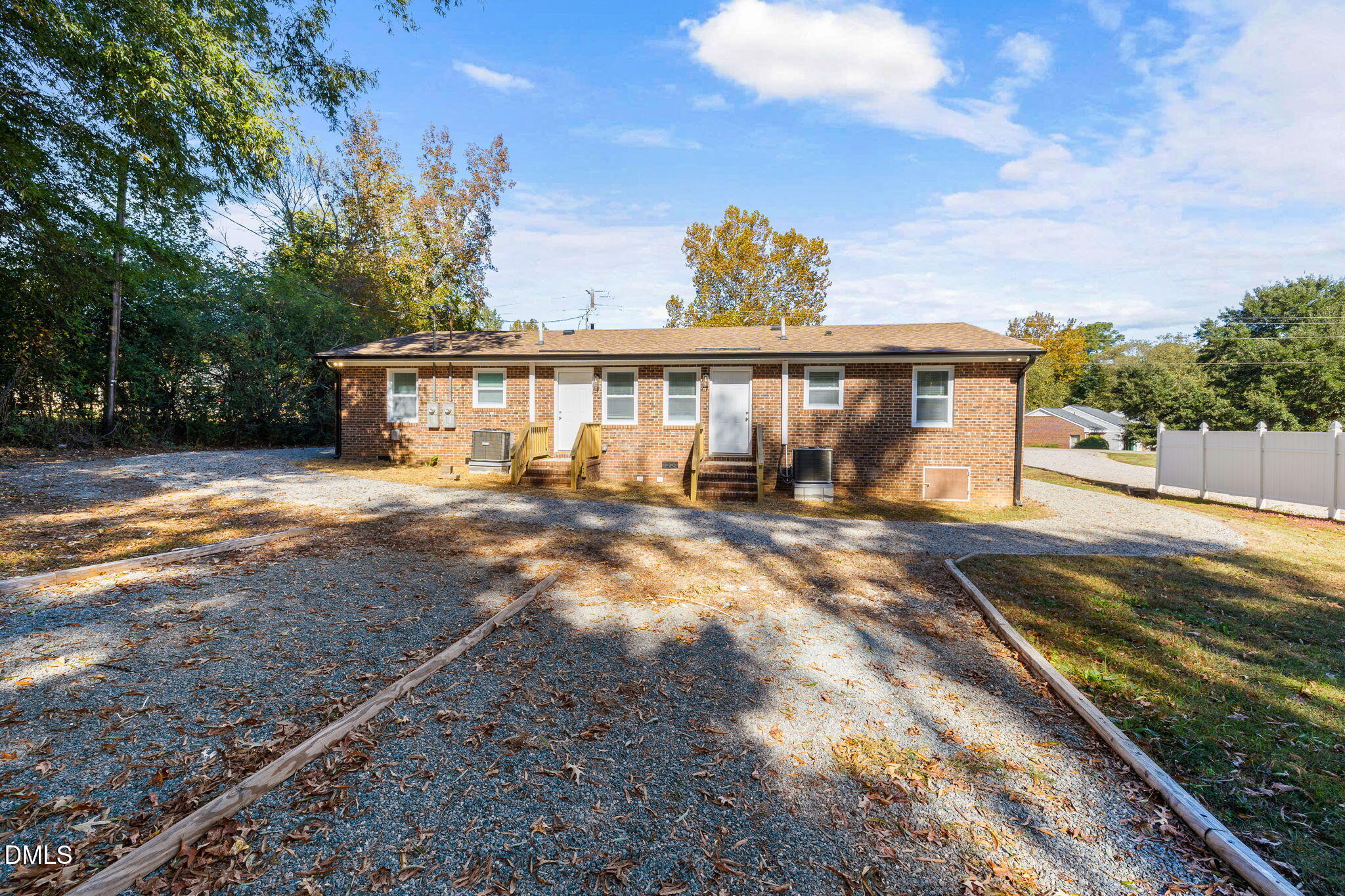 512 East Branch Street Spring Hope, NC 27882 - Photo 26 of 30 a view of a house with backyard and sitting area