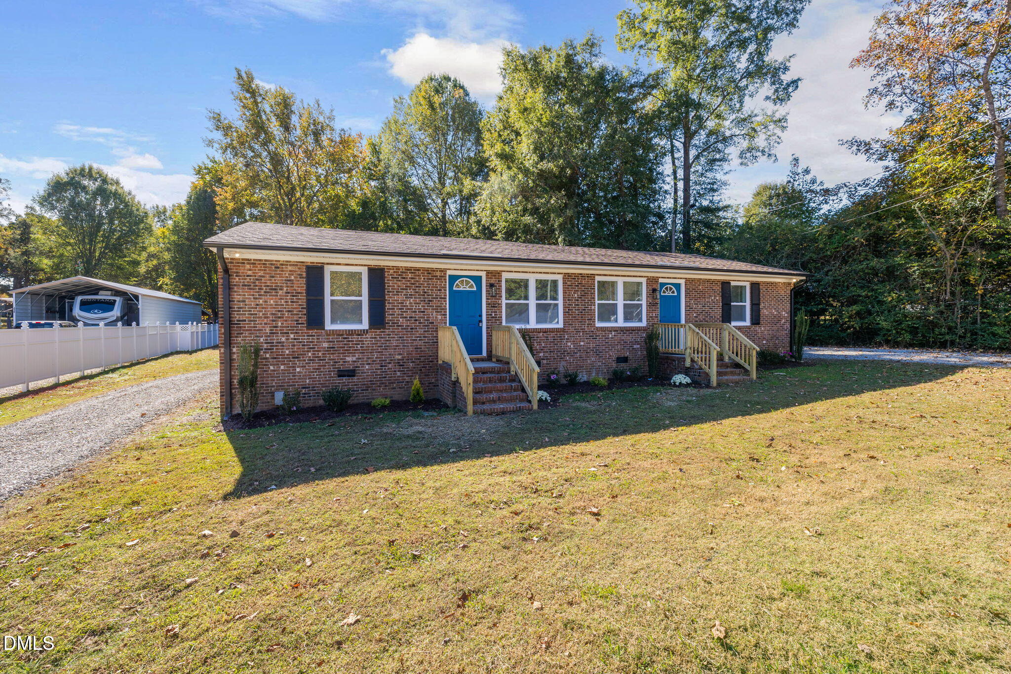 512 East Branch Street Spring Hope, NC 27882 - Photo 3 of 30 a view of a house with backyard and sitting area