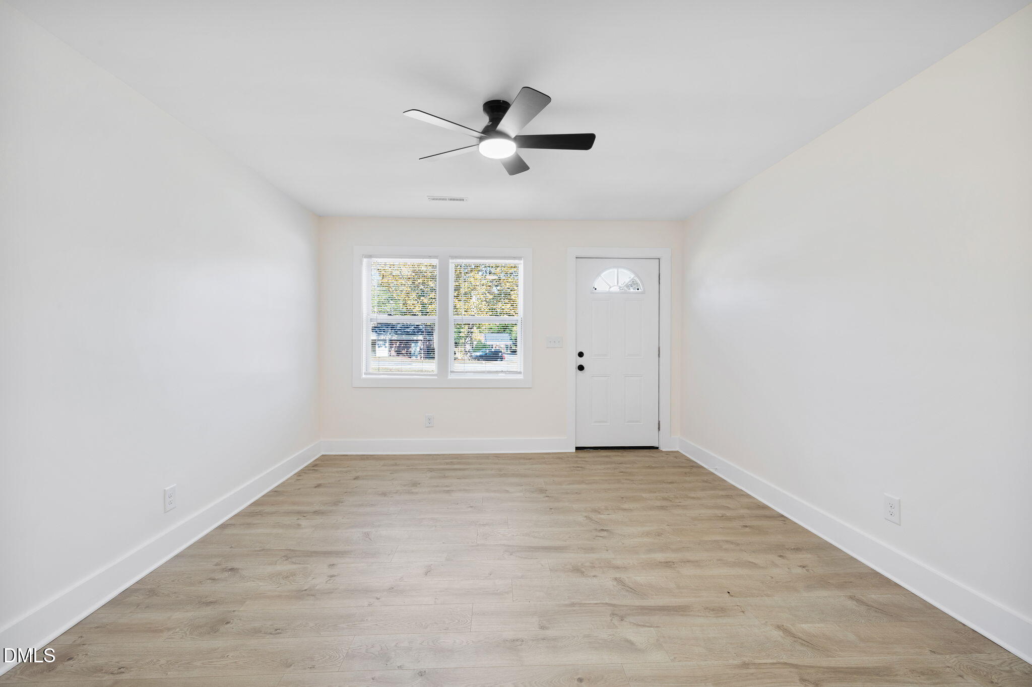 512 East Branch Street Spring Hope, NC 27882 - Photo 8 of 30 an empty room with windows and closet