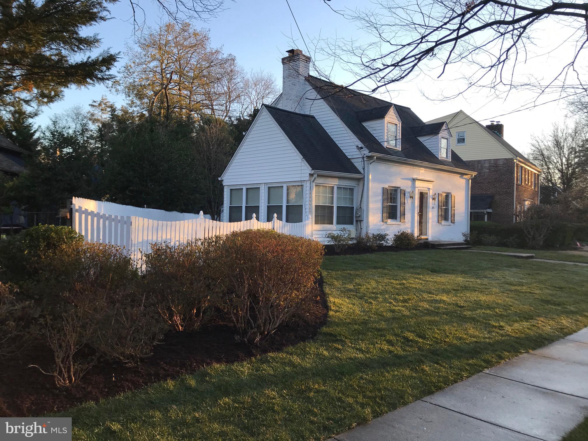 7807 Glenbrook Road Bethesda, MD 20814 - Photo 2 of 25 Side porch, scalloped picket fence and azaleas