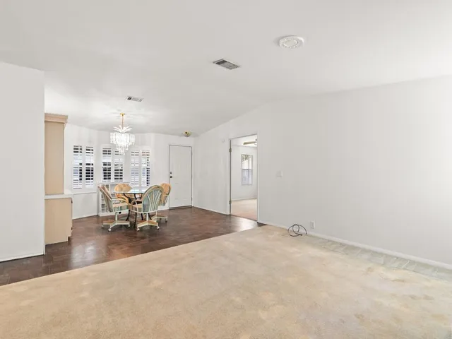 a living room with furniture and window