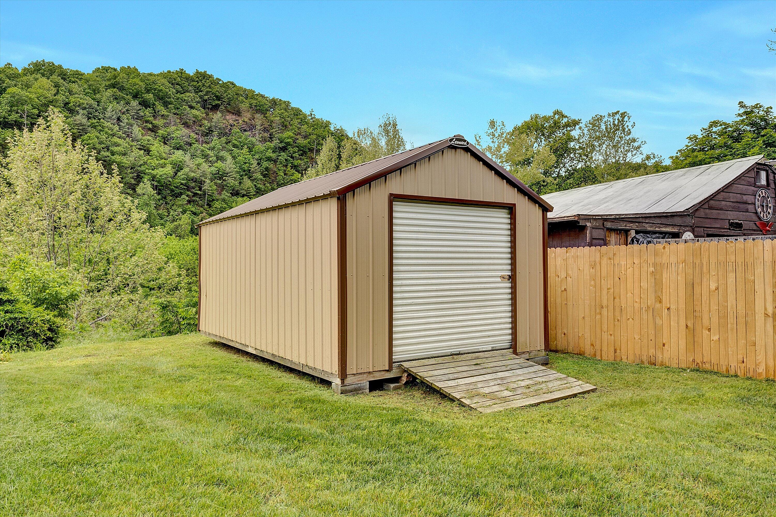 2015 Evergreen Road Covington, VA 24426 - Photo 41 of 46 a view of a backyard with a garden