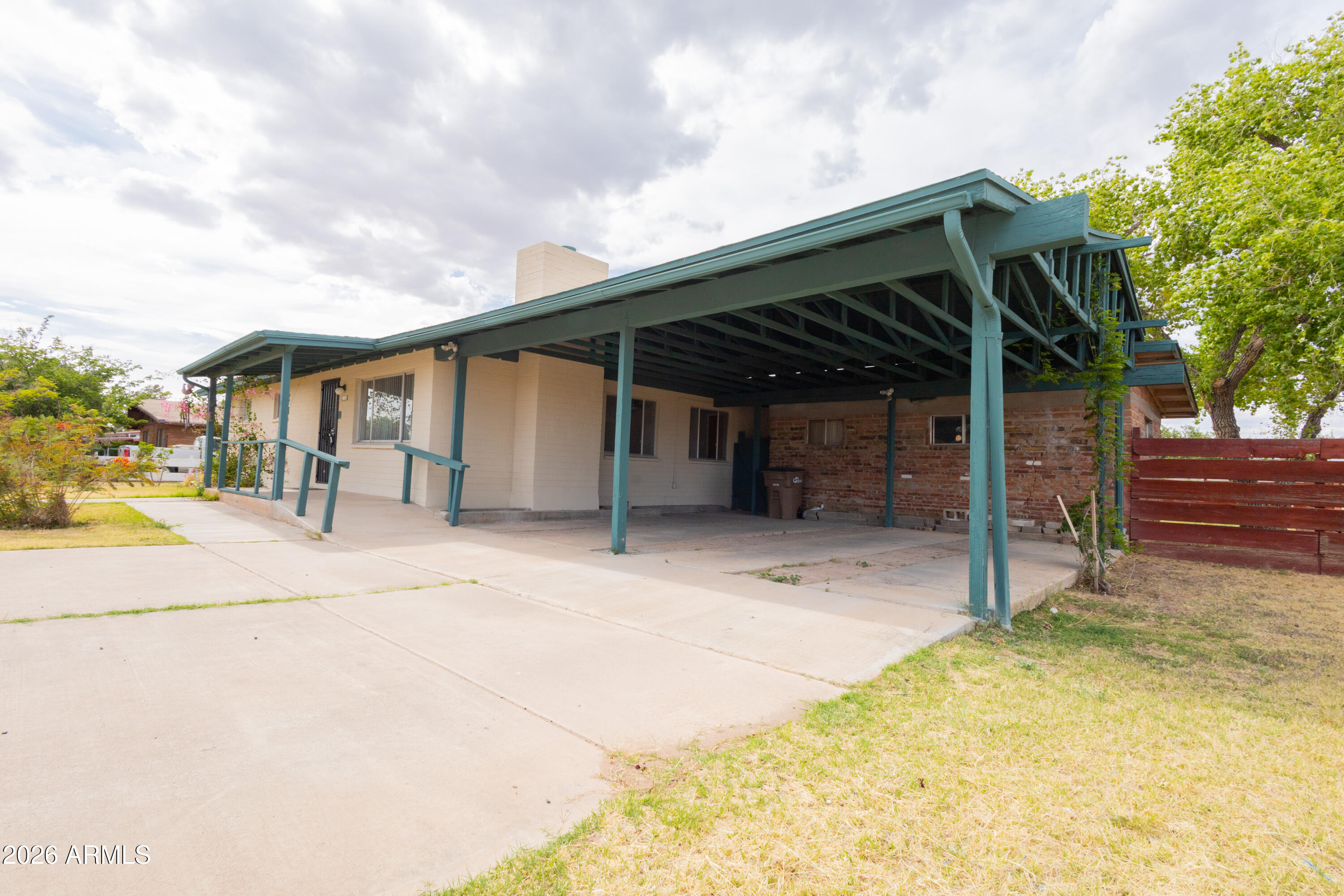 1626 11th Street Douglas, AZ 85607 - Photo 7 of 30 a view of a house with a backyard