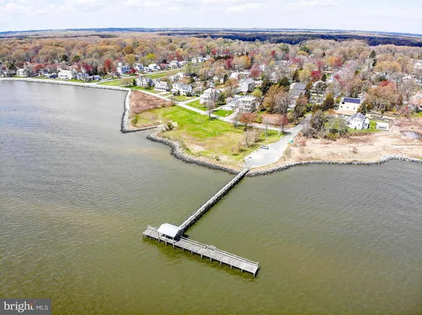 a view of a swimming pool with a yard