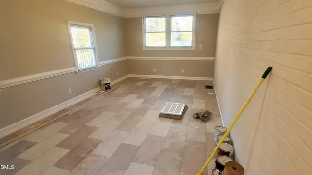 a bath room with a window