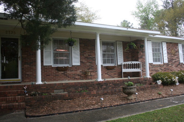 2735 Bonner Gilbert Road Lizella, GA 31052 - Photo 23 of 25 a front view of a house with garden
