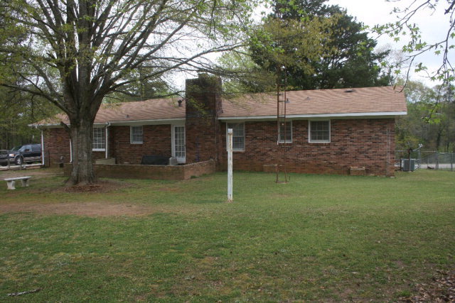 2735 Bonner Gilbert Road Lizella, GA 31052 - Photo 7 of 25 a view of a house with a yard