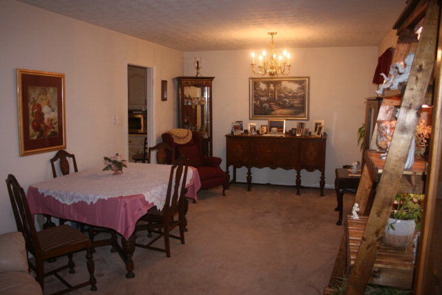 2735 Bonner Gilbert Road Lizella, GA 31052 - Photo 10 of 25 a view of a livingroom with furniture and a window
