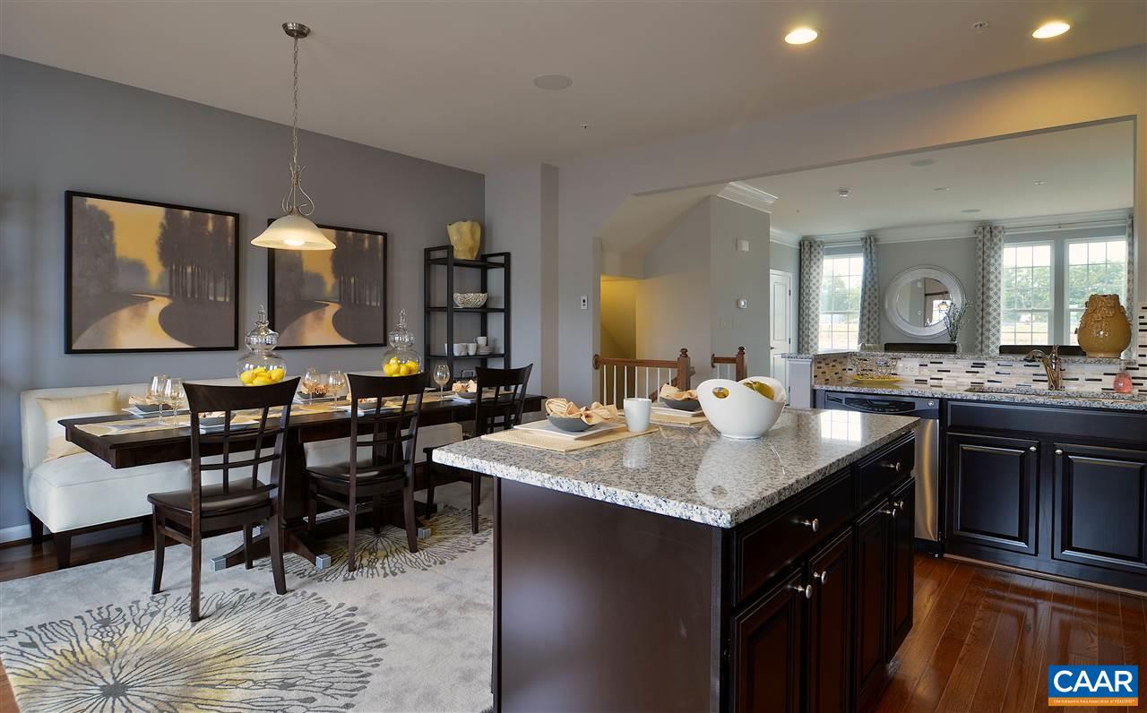 2555 Avemore Pond Road Charlottesville, VA 22911 - Photo 2 of 14 a kitchen with counter space dining table and chairs
