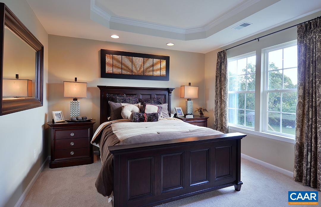 2555 Avemore Pond Road Charlottesville, VA 22911 - Photo 5 of 14 a bedroom with a bed and a large window