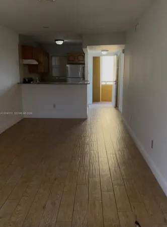 a view of a bathroom from the hallway