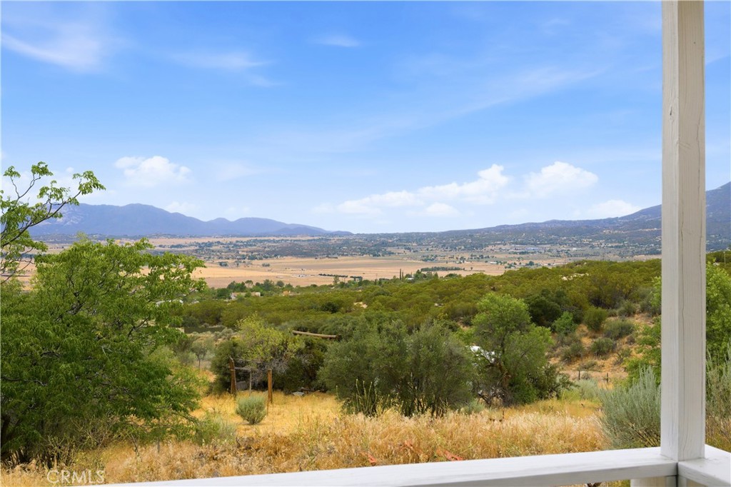59995 Granite Gulley Road Anza, CA 92539 - Photo 31 of 33 a view of a lake with a mountain in the background