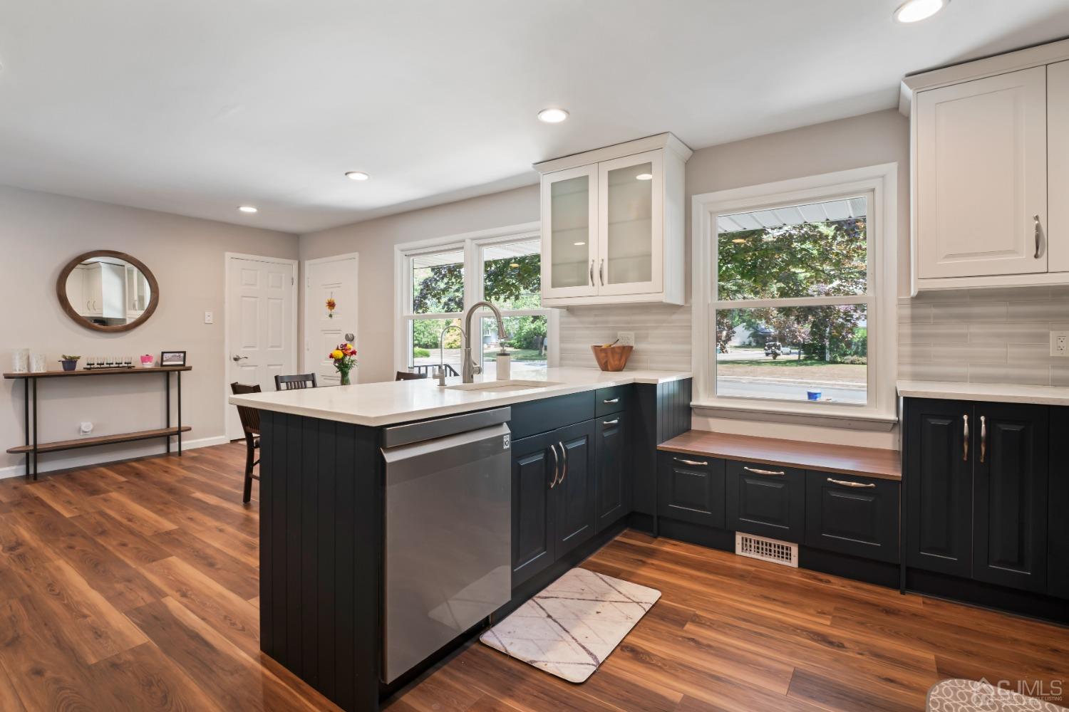 296 Colfax Road North Brunswick, NJ 08902 - Photo 12 of 37 a kitchen with granite countertop a sink cabinets and window