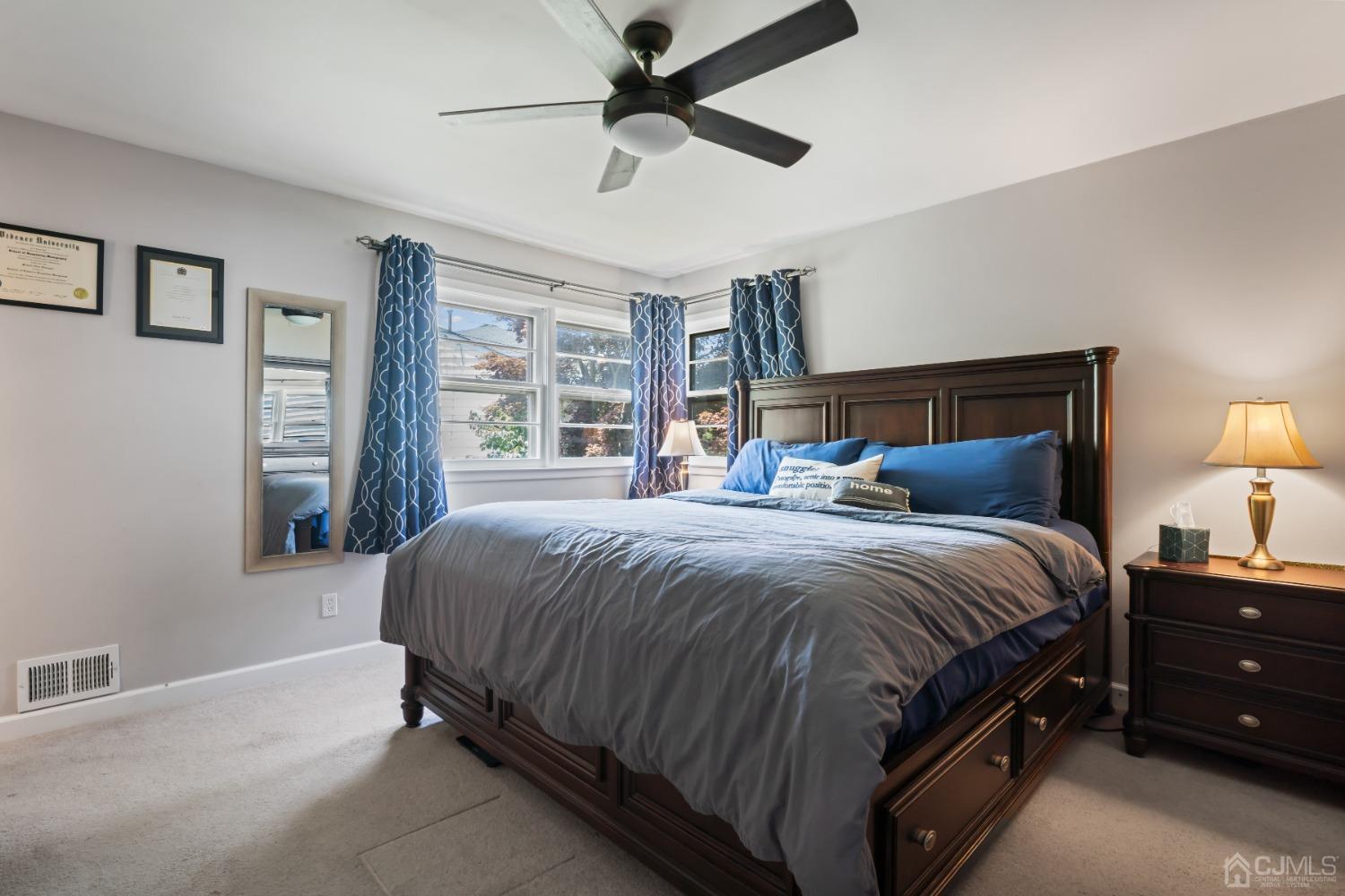 296 Colfax Road North Brunswick, NJ 08902 - Photo 20 of 37 a bedroom with a bed and window