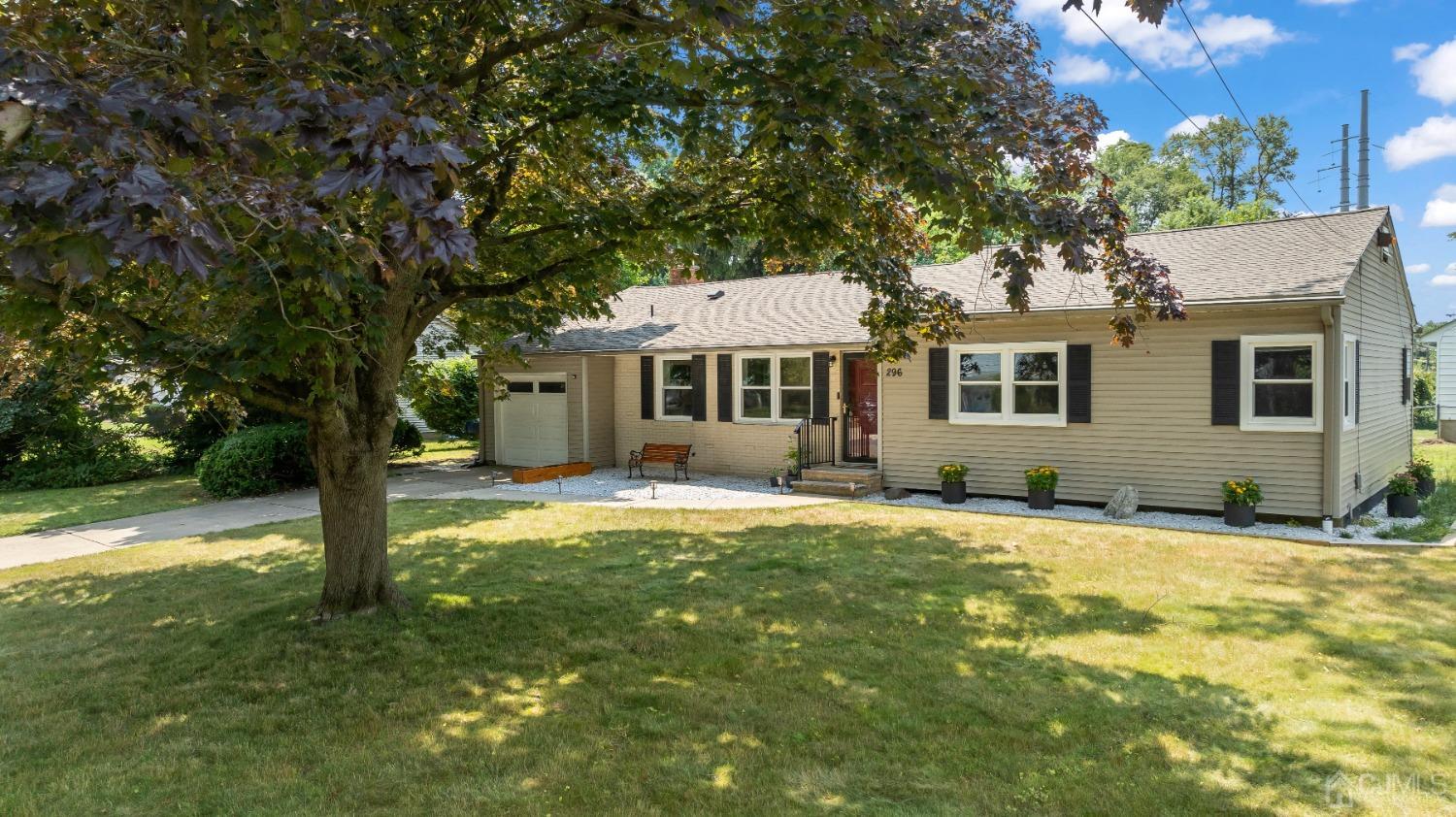 296 Colfax Road North Brunswick, NJ 08902 - Photo 2 of 37 a front view of a house with a yard