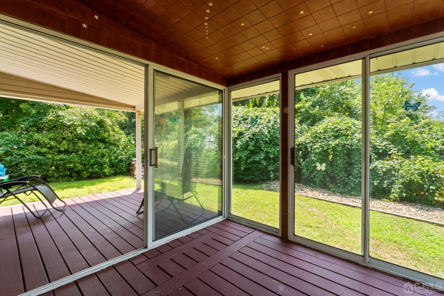 296 Colfax Road North Brunswick, NJ 08902 - Photo 32 of 37 a view of a balcony with wooden floor