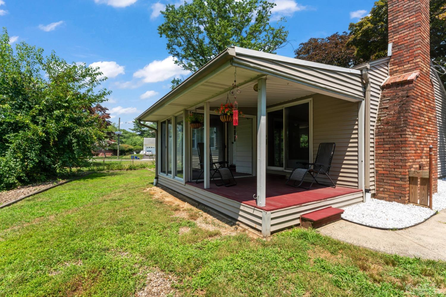 296 Colfax Road North Brunswick, NJ 08902 - Photo 34 of 37 a view of a chair and table in backyard of the house