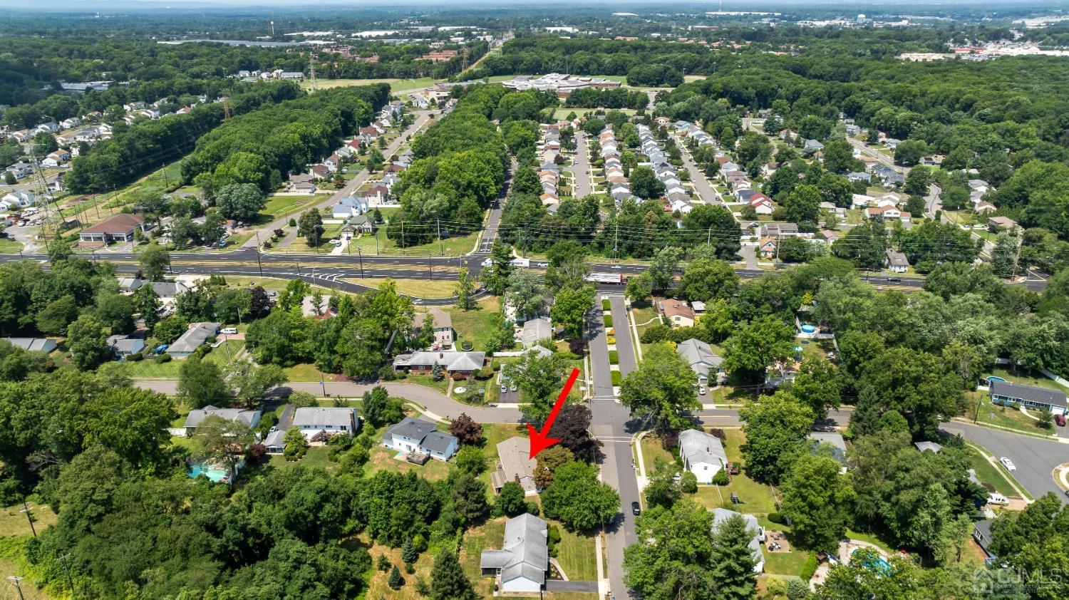 296 Colfax Road North Brunswick, NJ 08902 - Photo 5 of 37 an aerial view of residential houses with outdoor space and trees