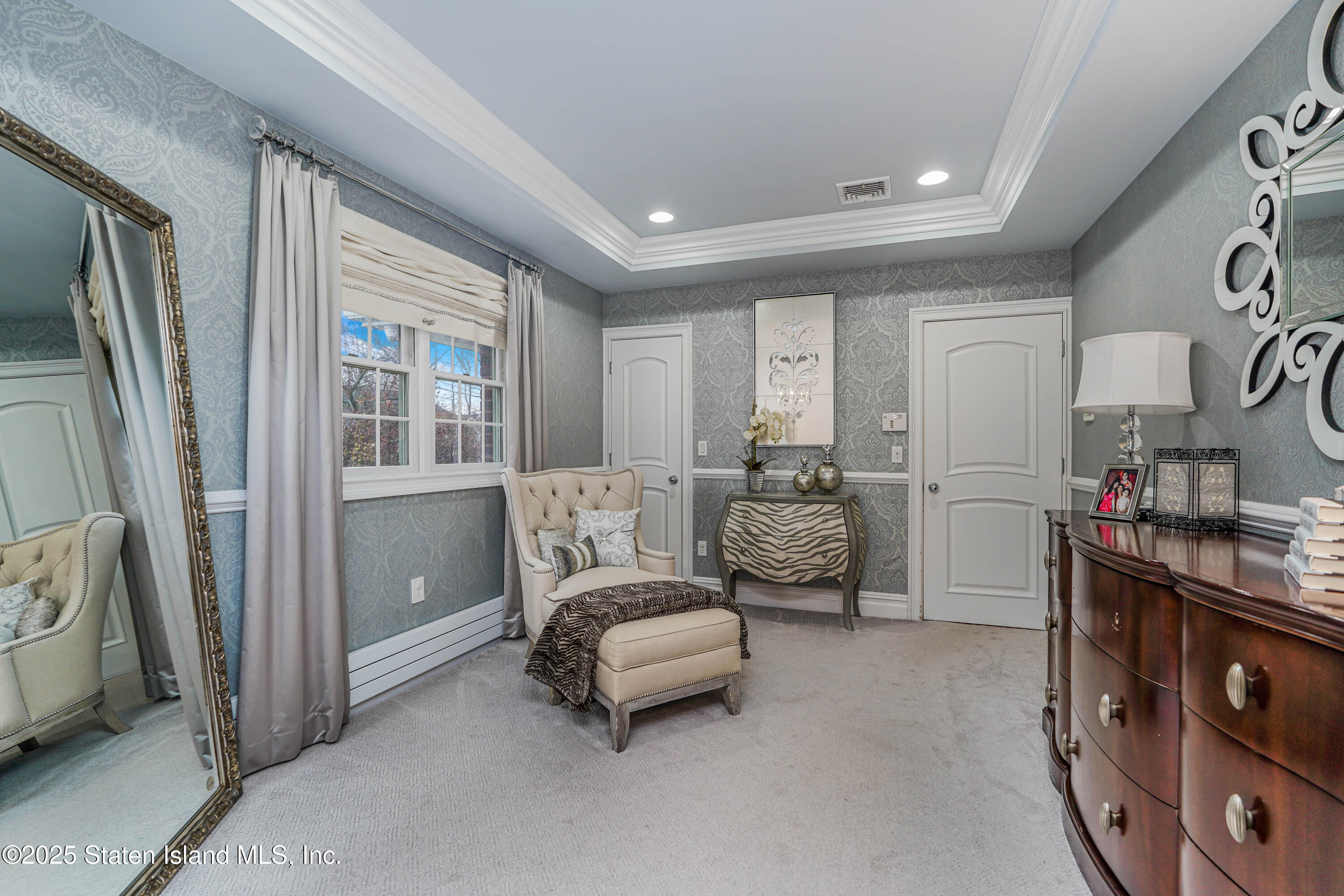 62 Ruxton Avenue Staten Island, NY 10312 - Photo 32 of 71 a living room with furniture and a window