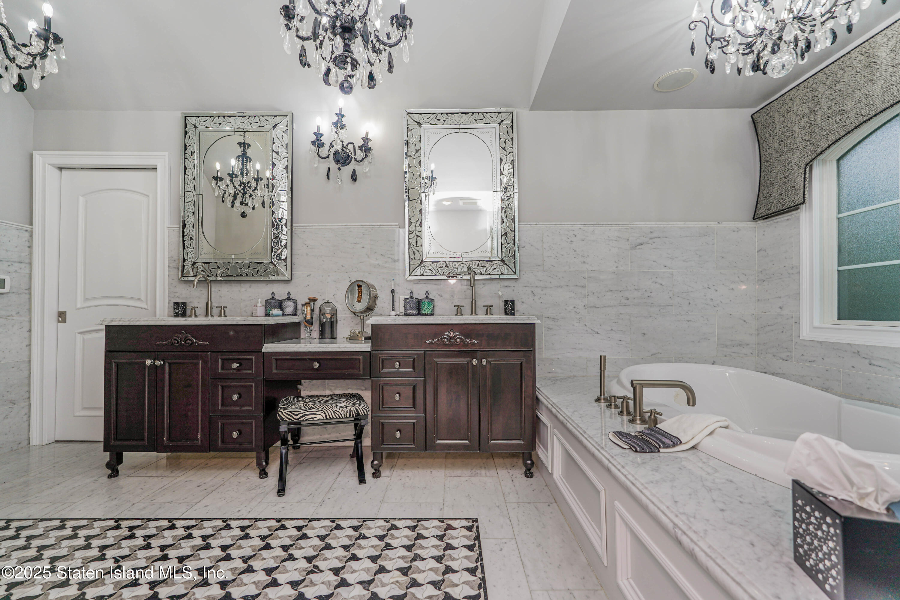 62 Ruxton Avenue Staten Island, NY 10312 - Photo 39 of 71 a spacious bathroom with a double vanity sink and a mirror