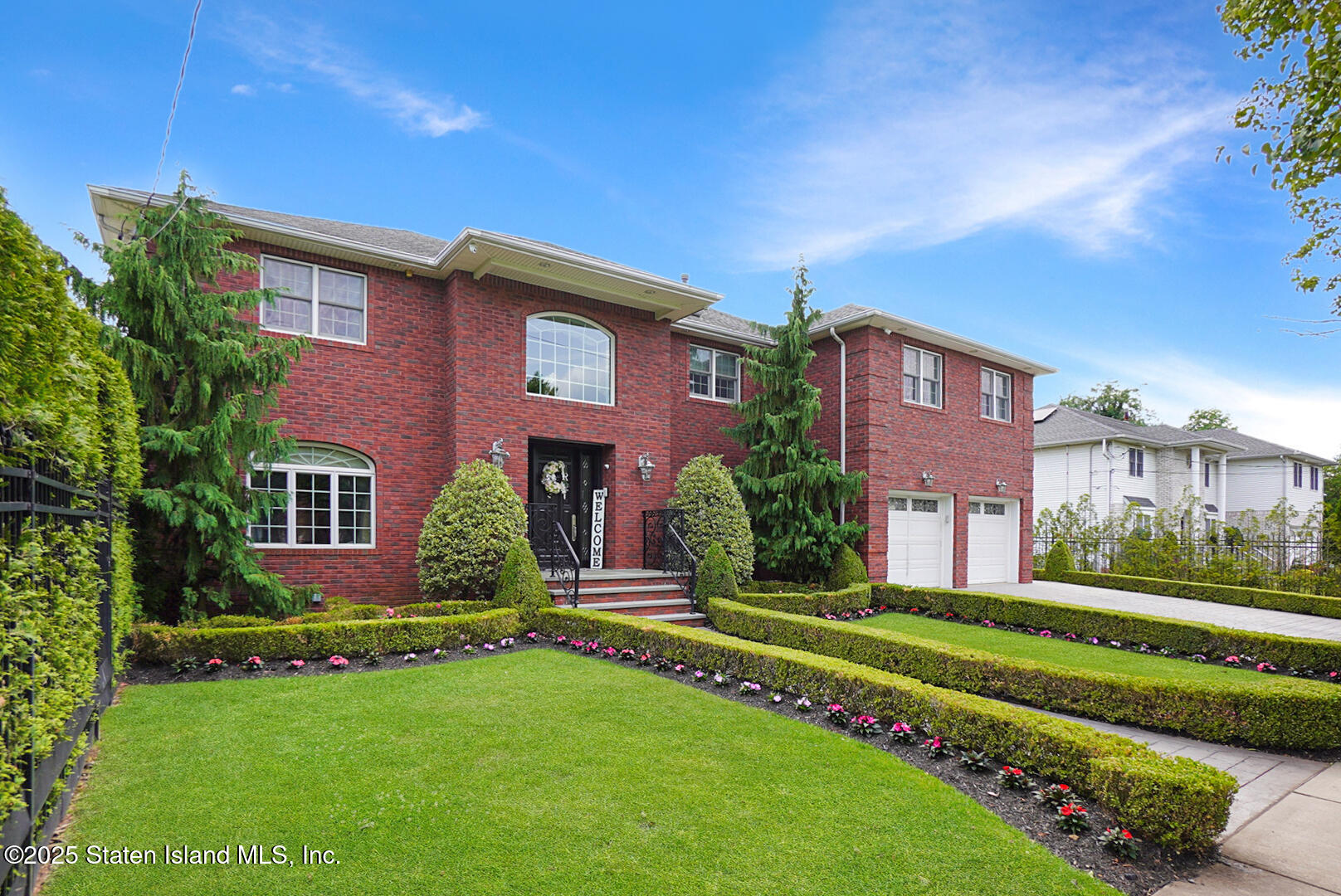 62 Ruxton Avenue Staten Island, NY 10312 - Photo 4 of 71 a front view of a house with a yard