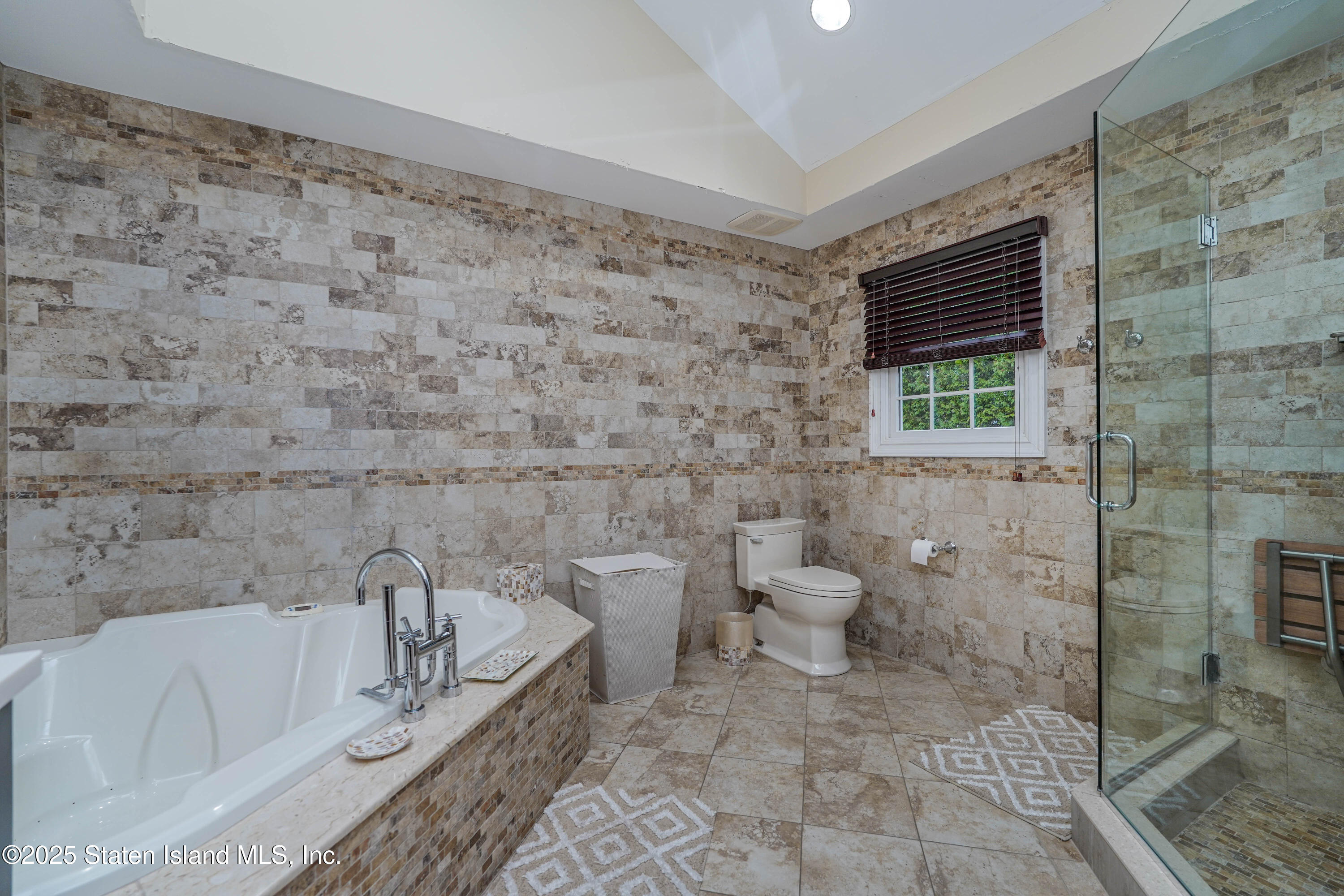 62 Ruxton Avenue Staten Island, NY 10312 - Photo 43 of 71 a bathroom with a toilet and a shower