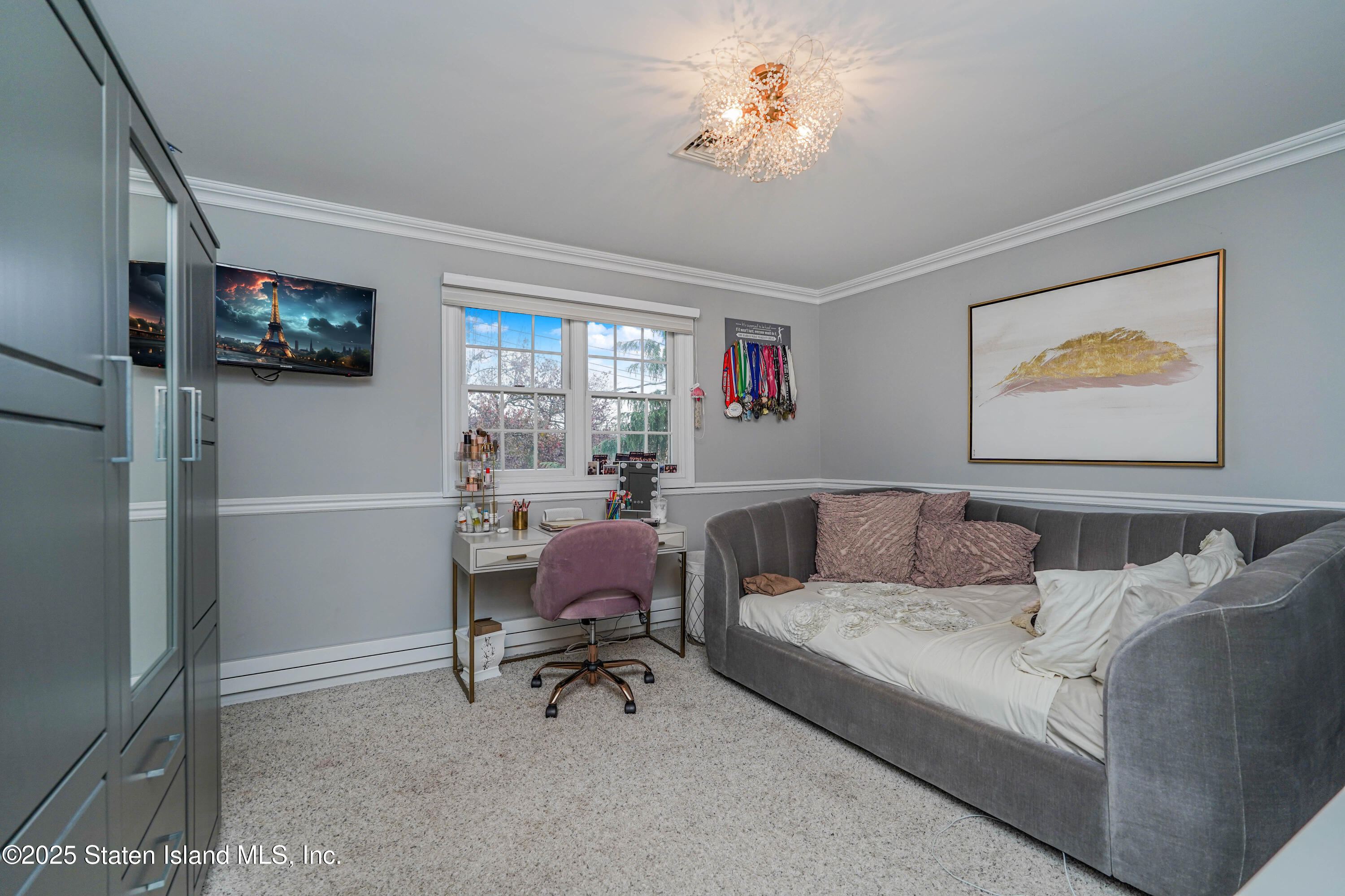 62 Ruxton Avenue Staten Island, NY 10312 - Photo 46 of 71 a living room with furniture and a flat screen tv