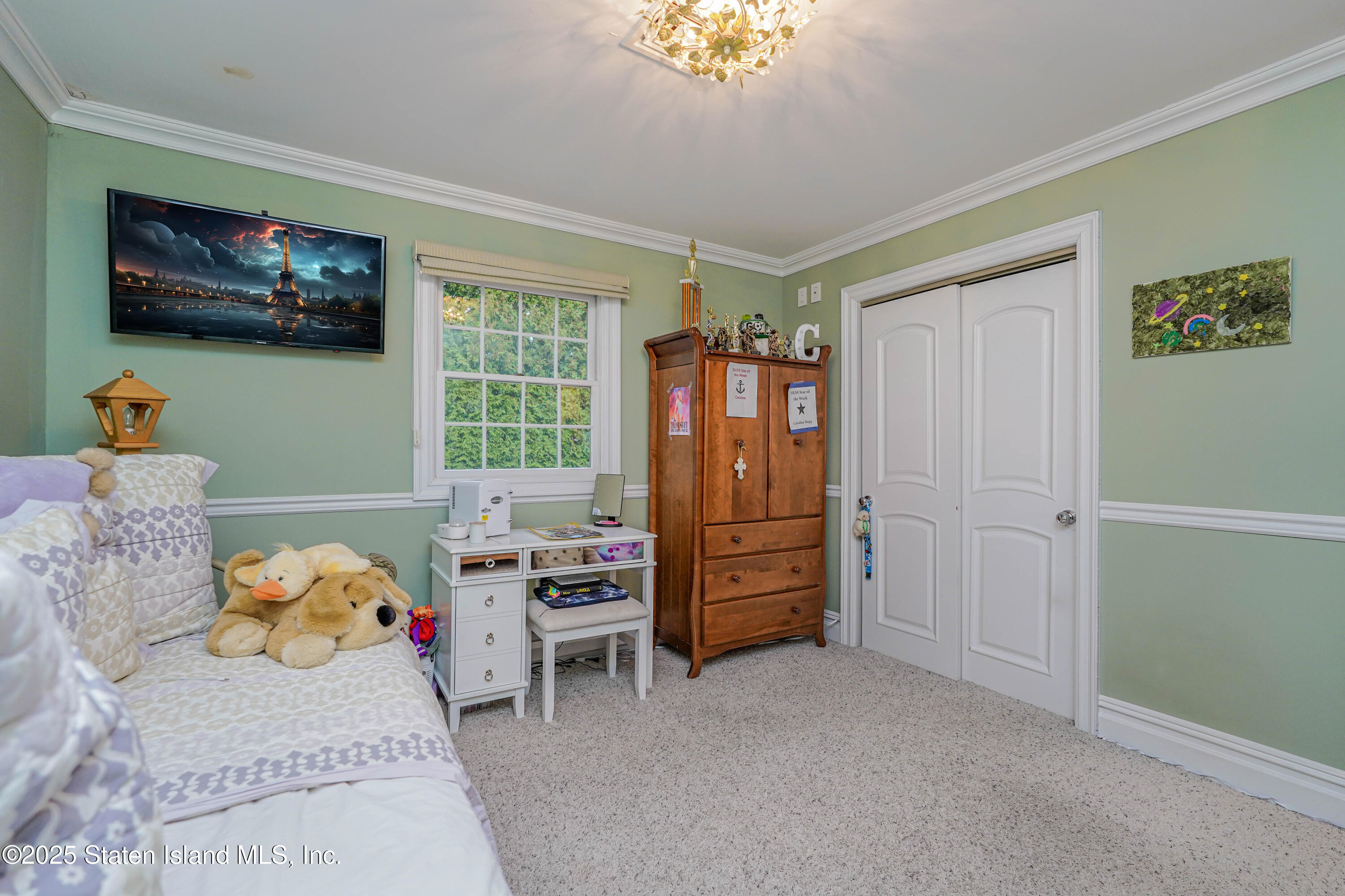62 Ruxton Avenue Staten Island, NY 10312 - Photo 48 of 71 a bedroom with a bed and a window