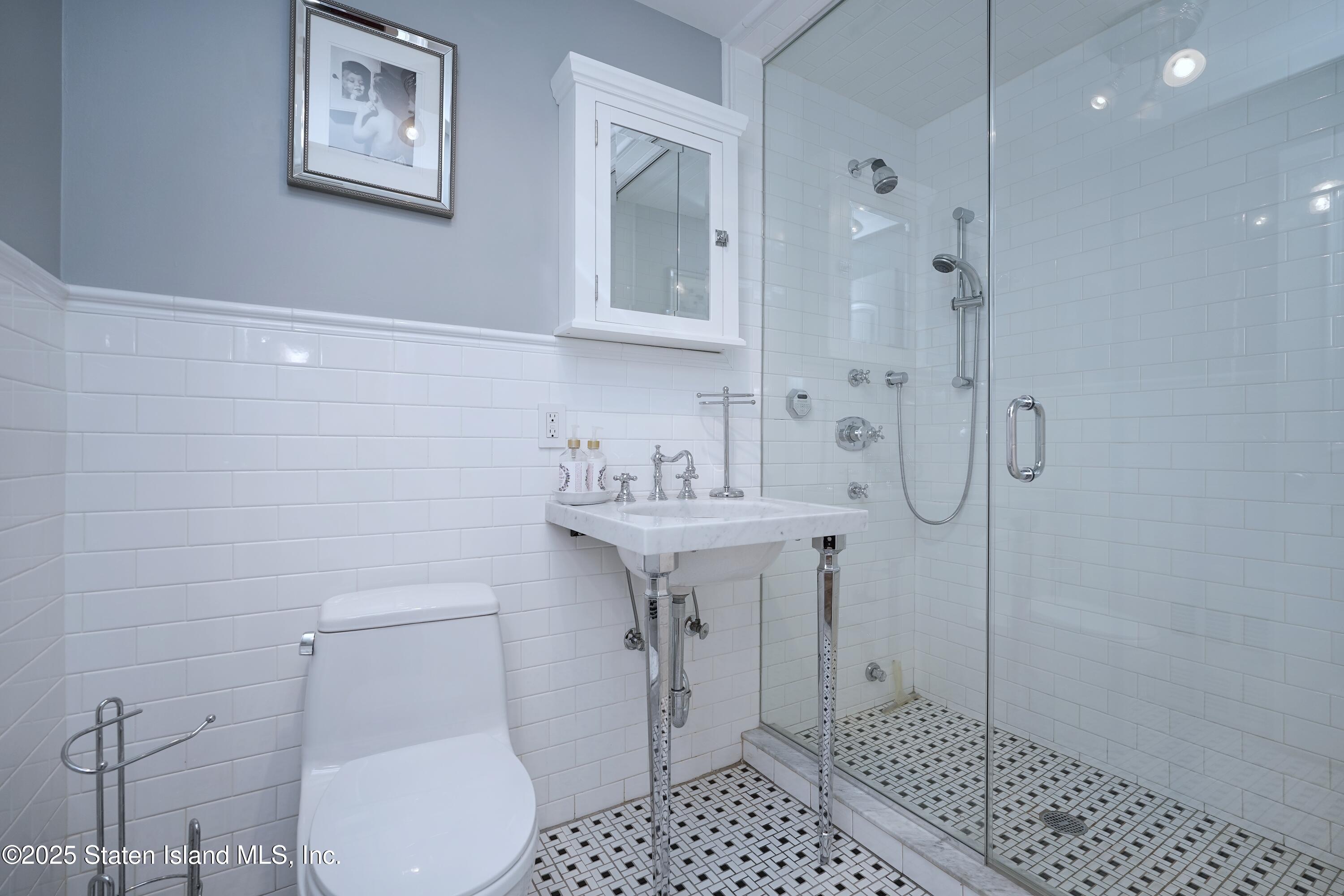 62 Ruxton Avenue Staten Island, NY 10312 - Photo 51 of 71 a bathroom with a sink toilet and shower