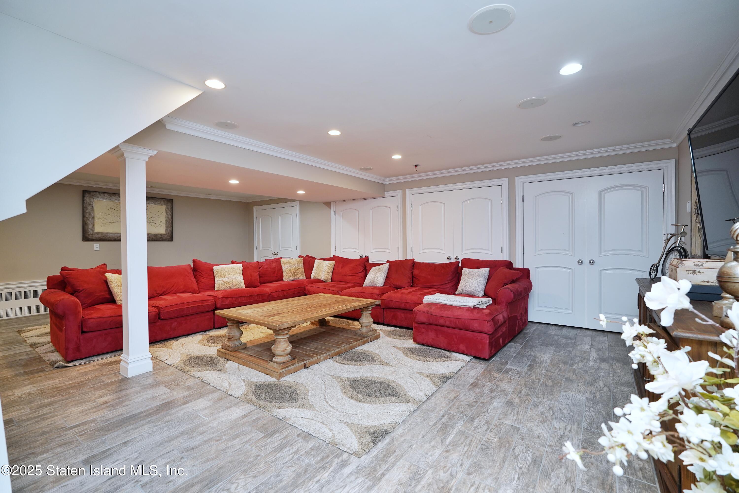 62 Ruxton Avenue Staten Island, NY 10312 - Photo 52 of 71 a living room with furniture and a couch