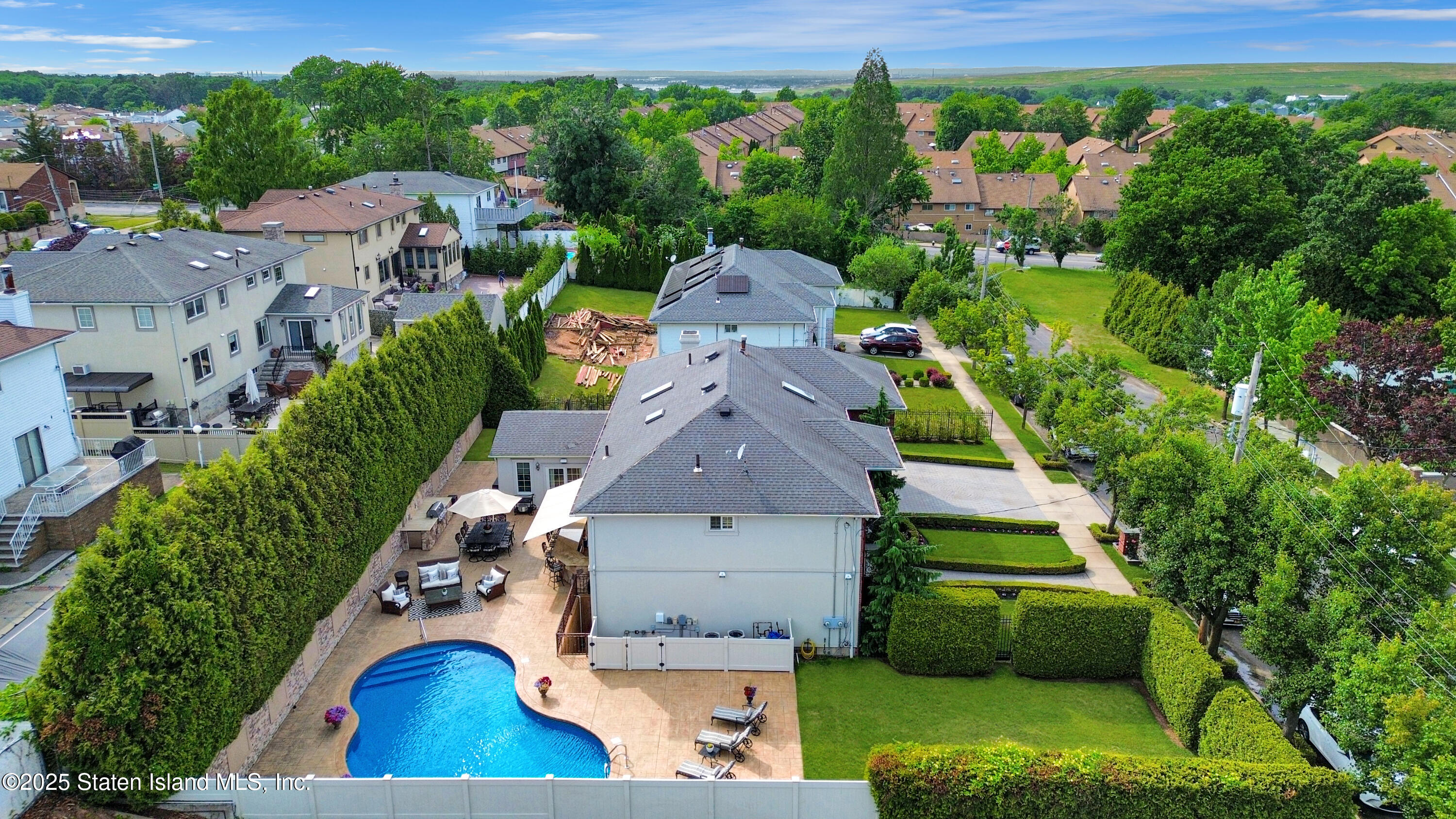 62 Ruxton Avenue Staten Island, NY 10312 - Photo 7 of 71 an aerial view of a house with a garden