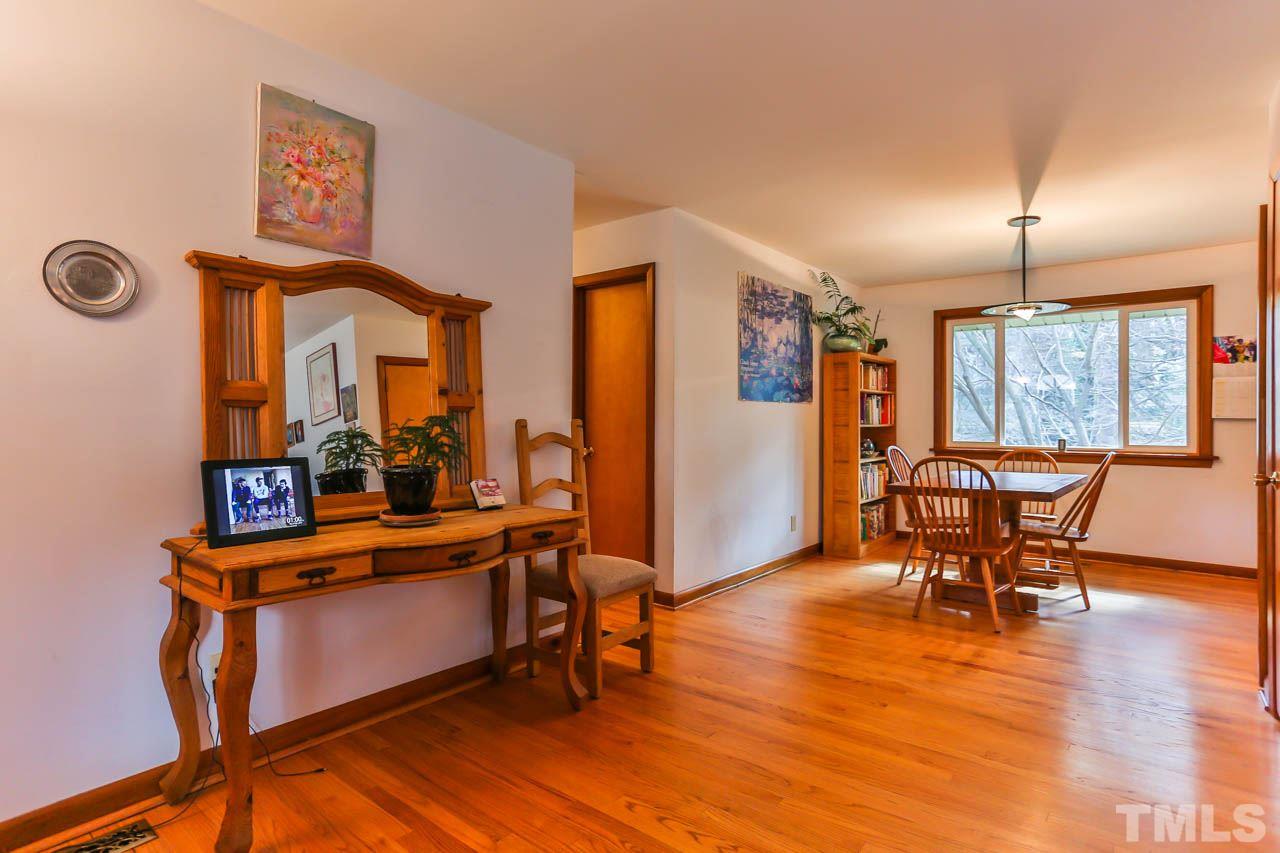 604 Beaver Dam Road Raleigh, NC 27607 - Photo 3 of 24 a view of a livingroom with furniture window and wooden floor