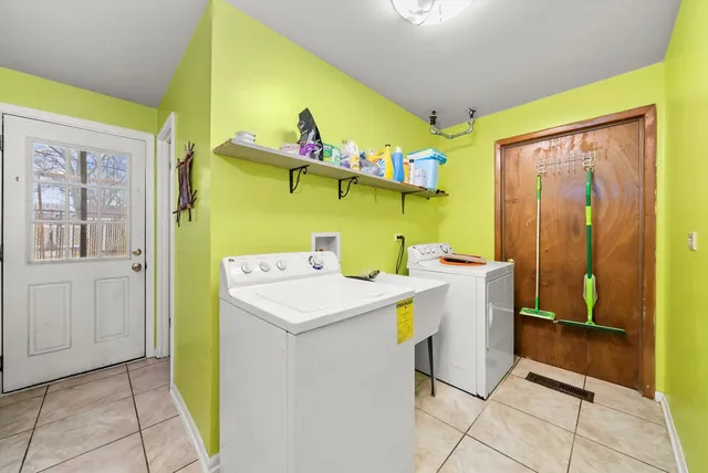 a utility room with dryer and washer