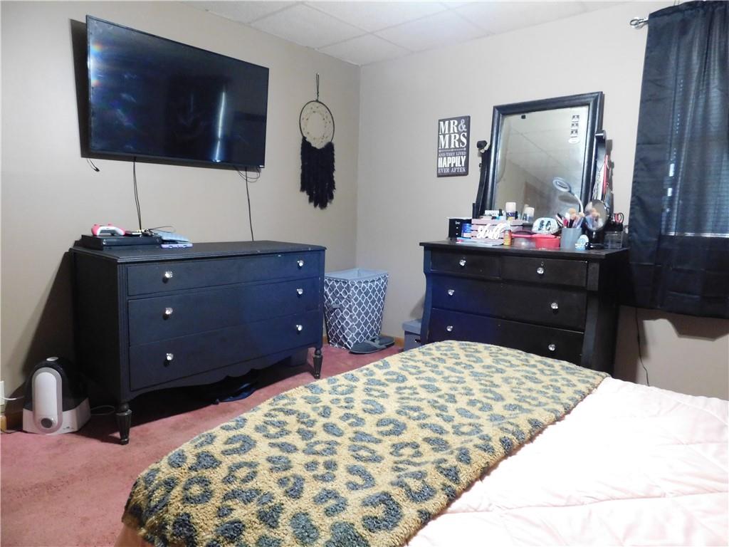 543 North Main Street Masontown, PA 15461 - Photo 13 of 32 a bed room with a bed and a television