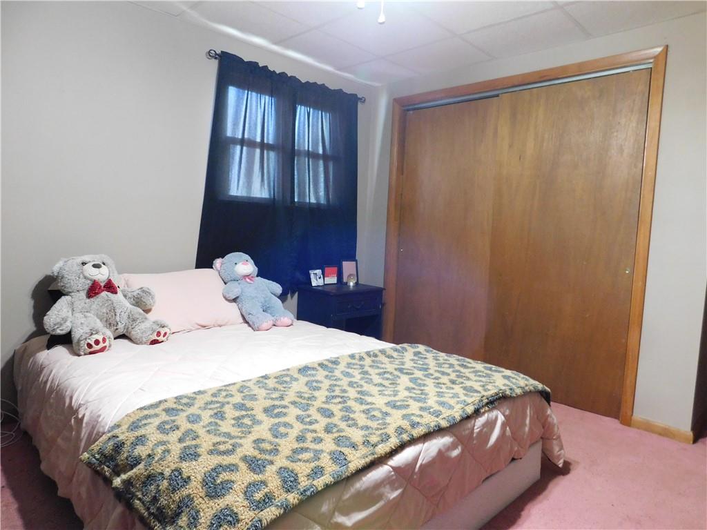 543 North Main Street Masontown, PA 15461 - Photo 14 of 32 a bedroom with a bed and window