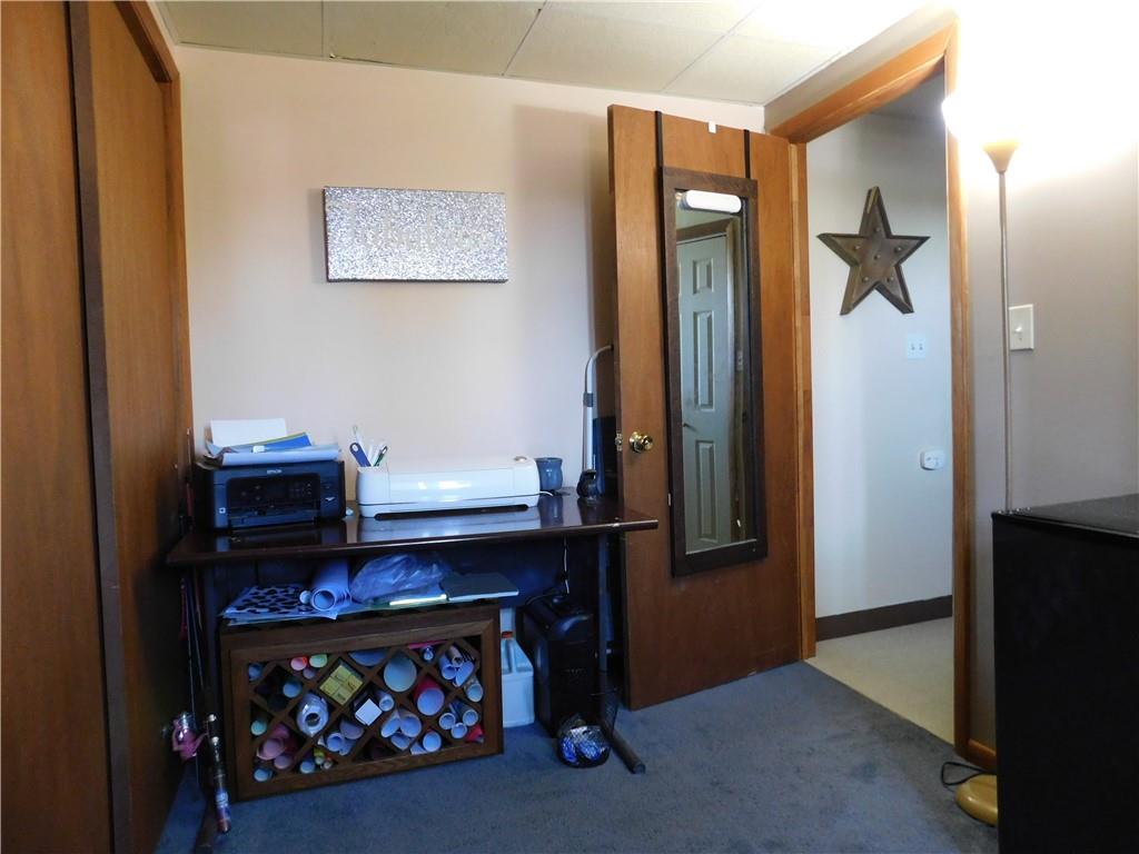 543 North Main Street Masontown, PA 15461 - Photo 17 of 32 a living room with furniture and a fireplace