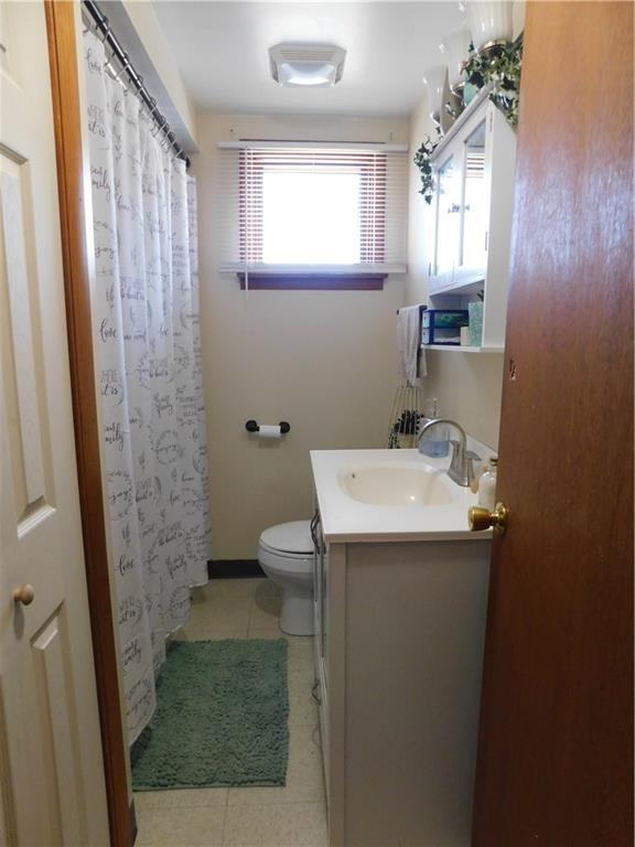 543 North Main Street Masontown, PA 15461 - Photo 18 of 32 a bathroom with a sink a mirror and a shower