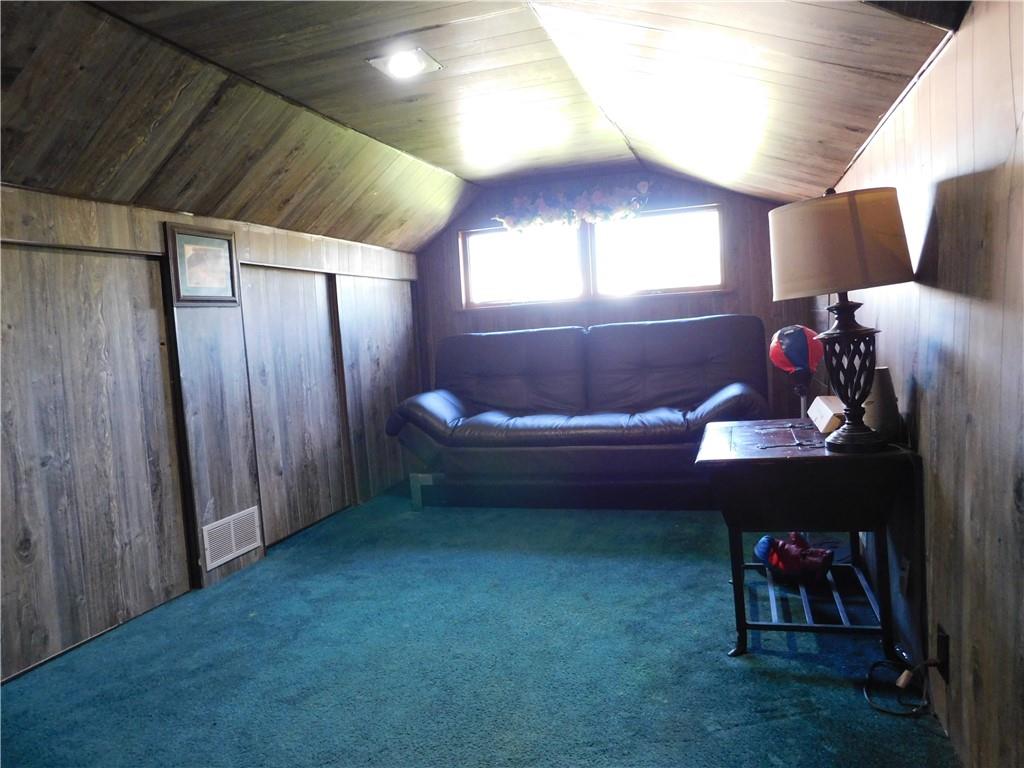 543 North Main Street Masontown, PA 15461 - Photo 19 of 32 a living room with furniture and a fireplace