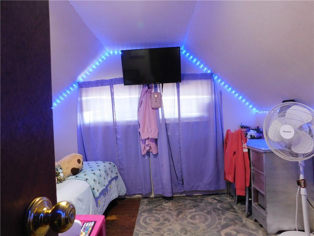 543 North Main Street Masontown, PA 15461 - Photo 22 of 32 a bedroom with a bed and a television