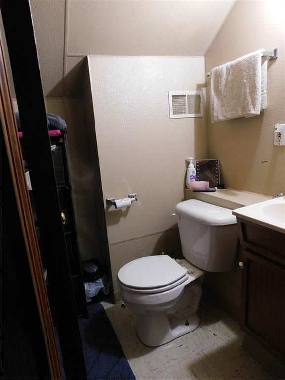 543 North Main Street Masontown, PA 15461 - Photo 25 of 32 a bathroom with a sink toilet and vanity