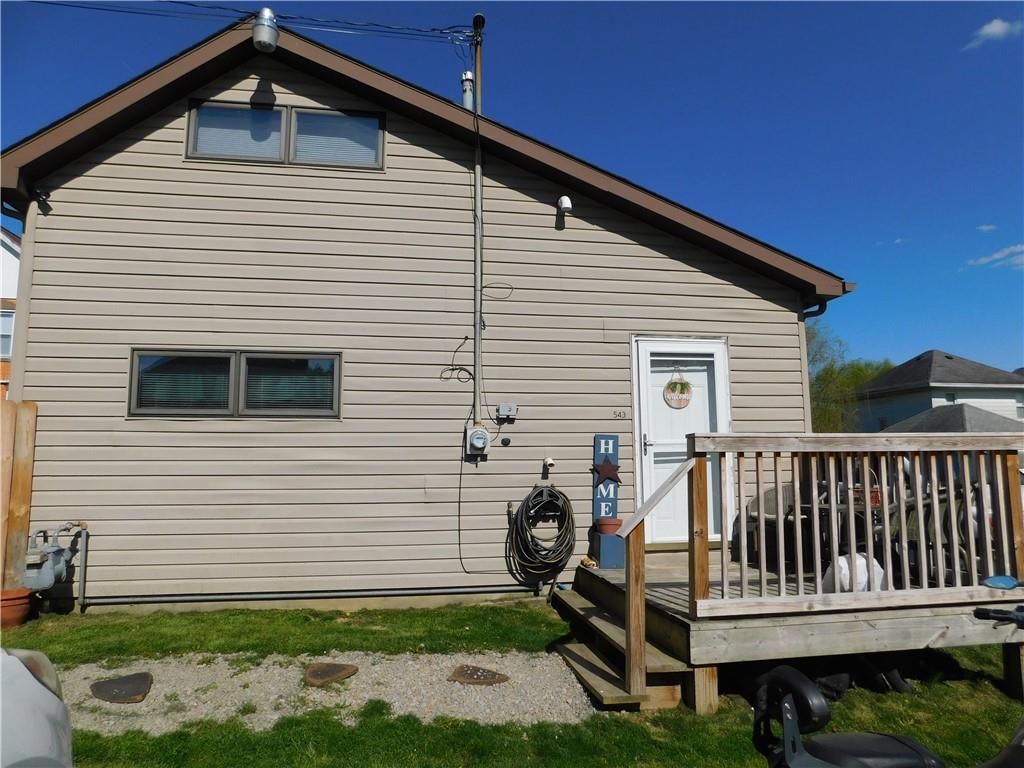 543 North Main Street Masontown, PA 15461 - Photo 28 of 32 a front view of a house with a garden
