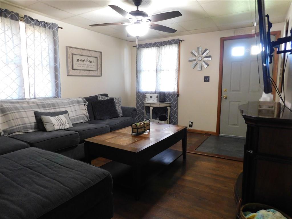 543 North Main Street Masontown, PA 15461 - Photo 3 of 32 a living room with furniture and a chandelier